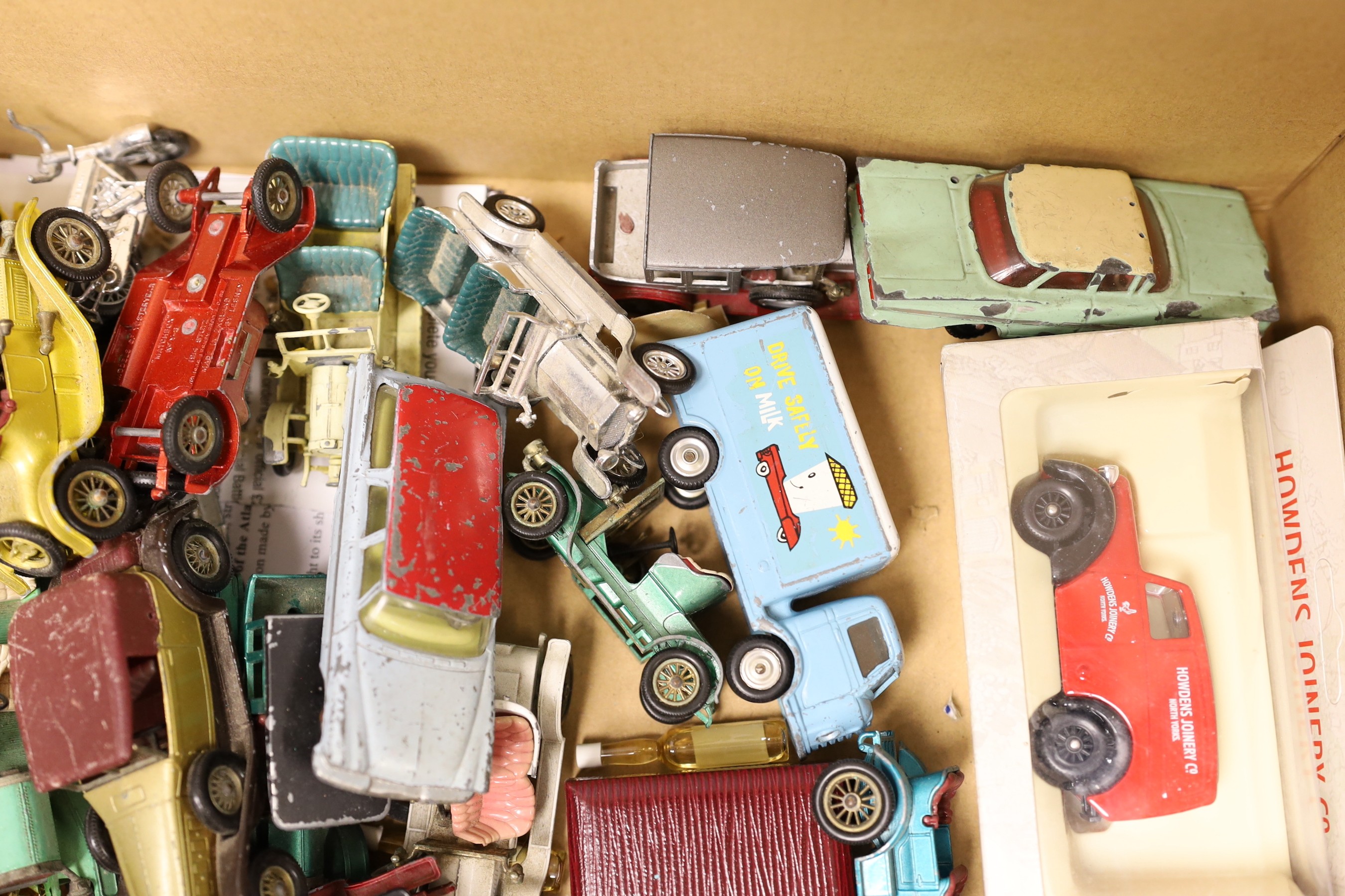 A collection of various die-cast cars